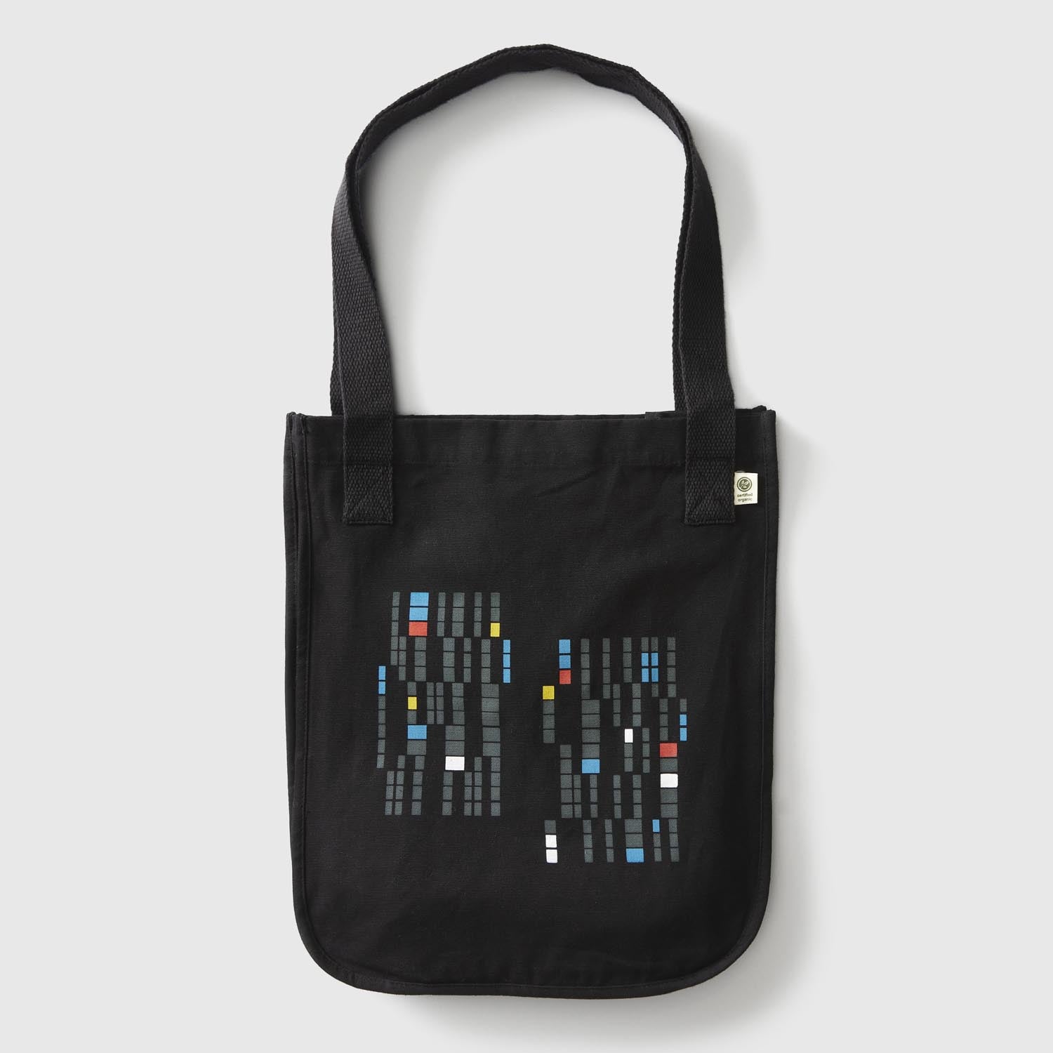 Black market tote with a design of rectangles in a variety of colors. minnesota clothing, minnesota apparel, minnesota accessories, minnesota gifts, minnesota goods, minnesota themed clothing, minnesota themed apparel, minnesota themed gifts, minnesota themed goods, minnesota totes, minnesota tote bags, minnesota tote, minnesota themed tote bags, minnesota themed totes, minnesota themed tote